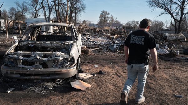 Texas firefighters battle flames stoked by strong winds as warnings are issued across the region