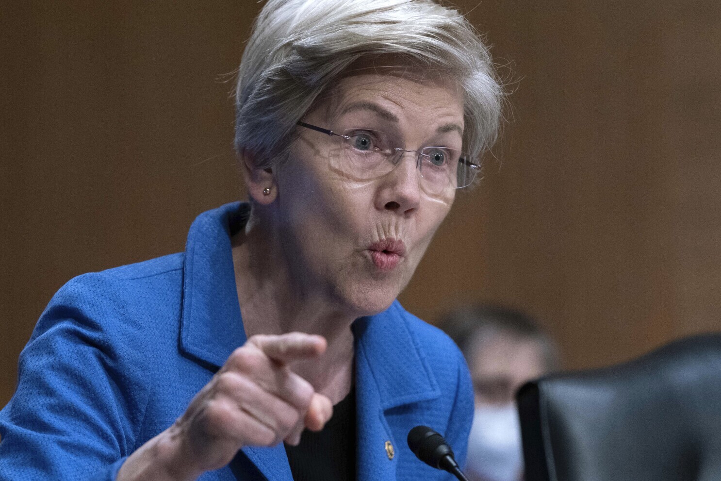 Warren Campaigns for Third Senate Term Against Deaton Amid Cryptocurrency Controversies and Policy Advocacy