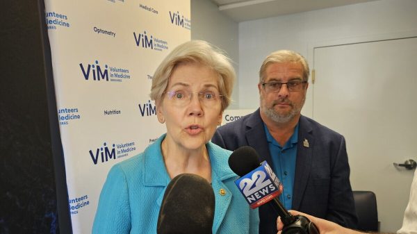 Warren Campaigns for Third Senate Term Against Deaton Amid Cryptocurrency Controversies and Policy Advocacy