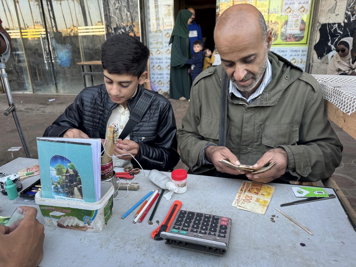 Jeweler-Turned-Money Repairman Helps Gaza Residents Navigate Cash Crisis Amid War and Blockade