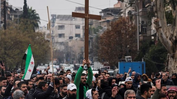 Protests Erupt in Damascus After Christmas Tree Burning, Highlighting Fears for Religious Minorities in Syria